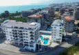 Купить Дуплекс 2+1 в Каргыджаке, 250 метров от пляжа - двухуровневый пентхаус с видом на море 3 