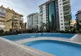 Купить Двухкомнатная квартира 83 м2 с мебелью и застеклённым балконом в центре Махмутлара - напрямую от собственника 4 
