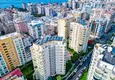 Купить Трехкомнатная квартира в Алании, район Махмутлар - с мебелью и частичным видом на море   2 