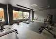 Купить Роскошный жилой комплекс в центре Махмутлара - недвижимость от застройщика в Алании, рассрочка до 3 лет 12