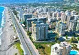 Купить Двухкомнатная квартира в Махмутларе на первой береговой - с видом на море 1
