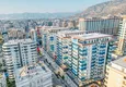 Купить Квартира 1+1 70 м² в центре Махмутлара – с мебелью, балкон остеклен, рассрочка до 1 года 2