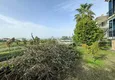 Купить Двухэтажная вилла 3+1 в Конаклы – с мебелью и видом на море в коттеджном комплексе 15
