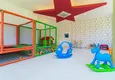 Купить Квартира 1+1 в центре Махмутлара - на 12 этаже с мебелью и видом на горы 13