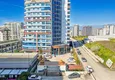Купить Квартира 1+1 в центре Махмутлара - на 12 этаже с мебелью и видом на горы 8