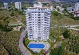 Купить Квартира 1+1 в Махмутларе – новая мебель, 70 м², остекленный балкон, вид на море и горы 1