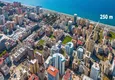 Купить Дуплекс 3+1 в Махмутларе - меблирован, с джакузи и застеклёнными балконами 2