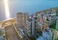 Купить Квартиры от застройщика в Махмутларе на первой береговой линии 3 