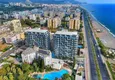 Купить Квартира 2+1 на первой береговой линии в Махмутларе – мебель, прямой вид на море  1 