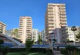 Купить Недвижимость в Алании под гражданство - квартира 2+1 с видом на море, Махмутлар, первая береговая 10