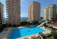 Купить Недвижимость в Алании под гражданство - квартира 2+1 с видом на море, Махмутлар, первая береговая 2