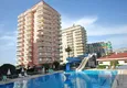 Купить Недвижимость в Алании под гражданство - квартира 2+1 с видом на море, Махмутлар, первая береговая 7