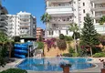 Купить Квартира в Алании под ВНЖ район Тосмур – 2+1 с мебелью, вид на море и горы 5
