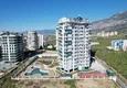 Купить Квартира 1+1 с видом на море в Махмутларе 3