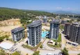 Купить Недвижимость в Алании с рассрочкой до 1 года - новая квартира 1+1 с видом на море в Авсалларе 7 