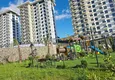 Купить Недвижимость в Алании с видом на море - квартира 1+1 в районе Махмутлар 13 