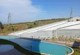 Доступная покупка Недвижимость в Алании с видом на море - квартира 1+1 в районе Махмутлар 14 