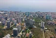 Купить Квартира в Алании по горячей цене – вид на море и горы, премиальный комплекс, район Махмутлар 1