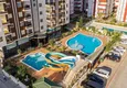Купить Квартира 1+1 в центре Махмутлара – мебель, остекленный балкон, 200 метров от моря 3