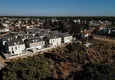 Купить Недвижимость под гражданство в Анталии - коттеджный комплекс в районе Дошемеалты 4