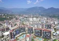 Купить Квартира 1+1 под ВНЖ в Алании, район Джикджилли - вид на море, мебель, резиденция премиум-класса 3