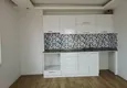 Доступная покупка Апартаменты 1+1 в районе Махмутлар с видом на море 1 