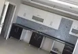 Доступная покупка Квартира с двумя спальнями в районе Махмутлар. 3