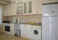 Доступная покупка Апартаменты с двумя спальнями в центре района Махмутлар. 1 