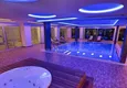 Купить Апартаменты 2+1 с панорамным видом на море в районе Тосмур 3