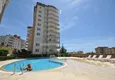 Купить Квартира с двумя спальнями в закрытом комплексе недалеко от моря в Тосмуре, Алания 1