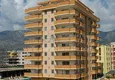 Купить Квартиры в комплексе у моря в Махмутларе, Алания 36 