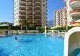 Купить Апартаменты 2+1 в центре района Махмутлар 14 