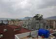 Купить Двухуровневый пентхаус в районе Тосмур 19