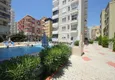 Купить Комфортабельные апартаменты 1+1 в центре района Махмутлар 2 