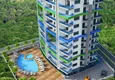 Купить Новый комплекс интересного дизайна в Махмутларе 9