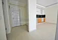 Купить Новая квартира в современном комплексе в центре Махмутлара 6 