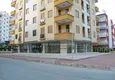 Купить 2+1 в современном муниципальном доме в самом центре района Лиман (Коньялты) 1