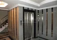 Купить 2+1 в современном муниципальном доме в самом центре района Лиман (Коньялты) 4