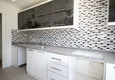 Купить Двухкомнатная квартира в новом комплексе в Коньялты 26