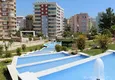 Купить Шикарный жилой комплекс в Тосмуре всего в 200 метрах от моря с большой территорией по лучшим ценам! 84 