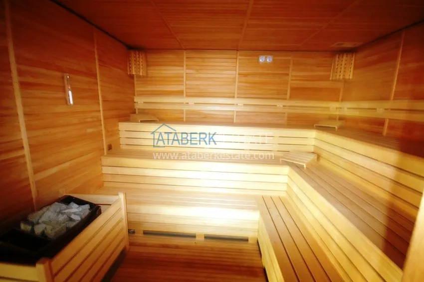 Апартаменты 1+1 с собственным пляжем в районе Авсаллар 7 