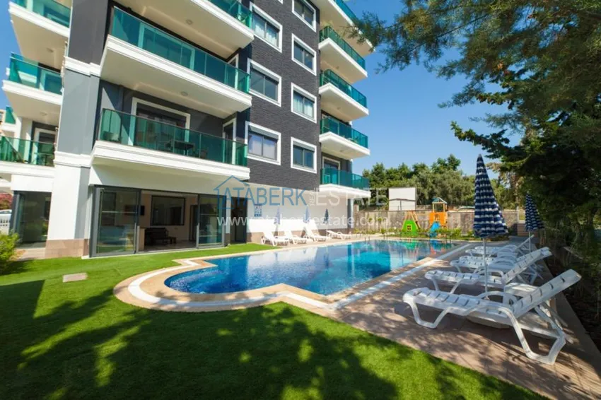 Апартаменты в аренду в комплексе с богатой и зеленой территорией 1