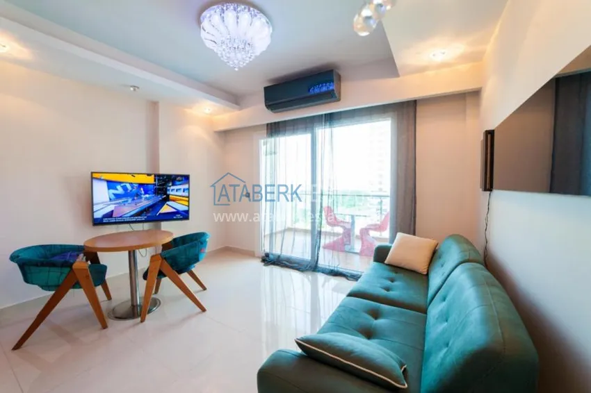 Приобрести Аренда квартиры-студии в Махмутларе с мебелью в престижном комплекс-отеле  1 