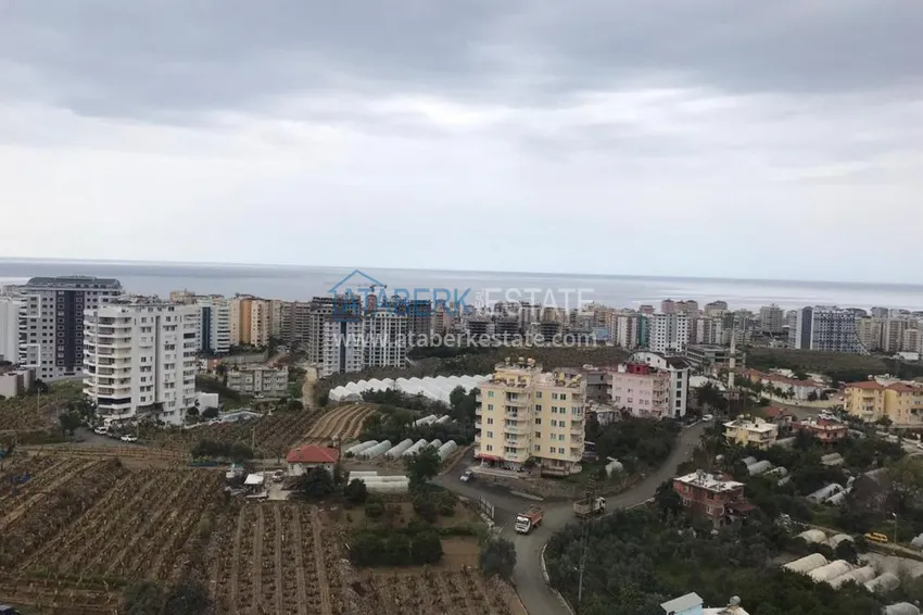 Приобрести Меблированный двухуровневый пентхаус с видом на море в районе Махмутлар 2