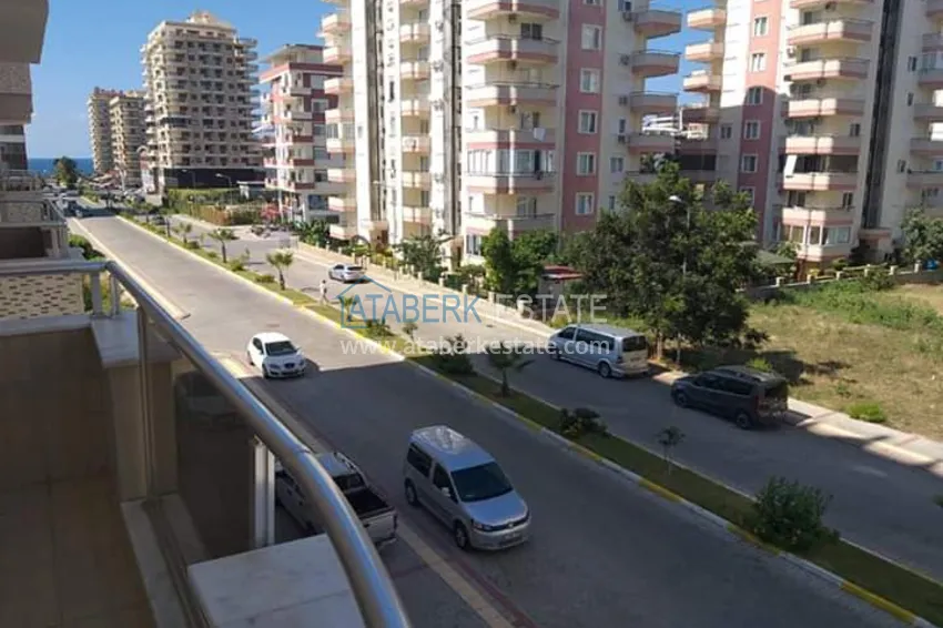 Приобрести Большая квартира в Махмутларе с видом на горы и частичным на море  15 