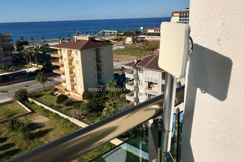 Приобрести Двухкомнатная квартира в Махмутларе с мебелью и видом на море 7
