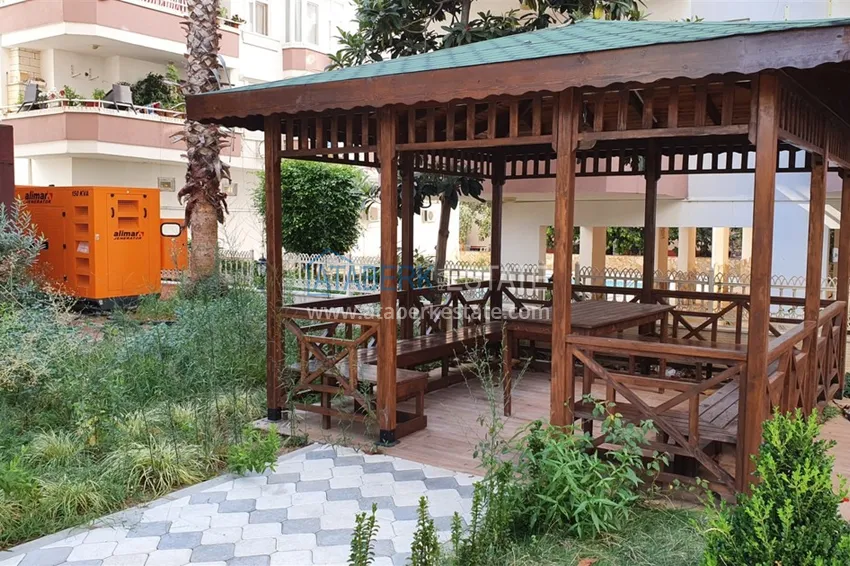 Квартира в Махмутларе с чистовой отделкой на центральной улице района 5 
