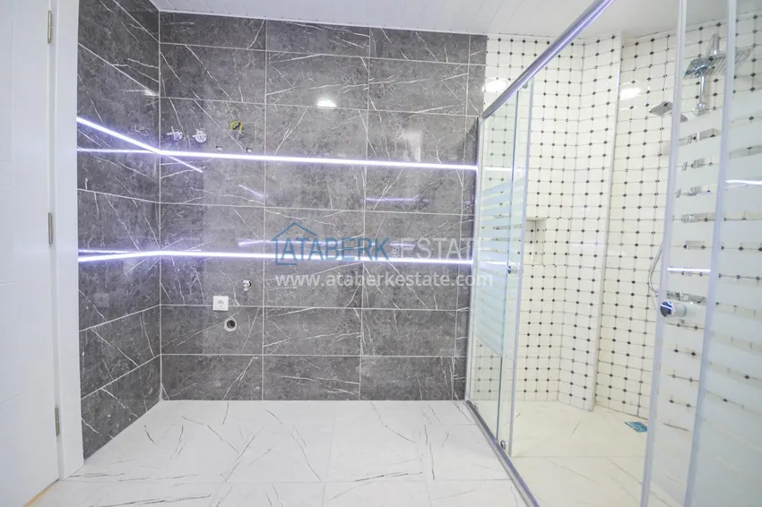 Приобрести Квартира в Махмутларе после ремонта в комплексе городского типа с бассейном 13 