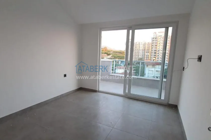 Приобрести Пентхаус-дуплекс в Махмутларе с чистовой отделкой видом на горы и море  3 