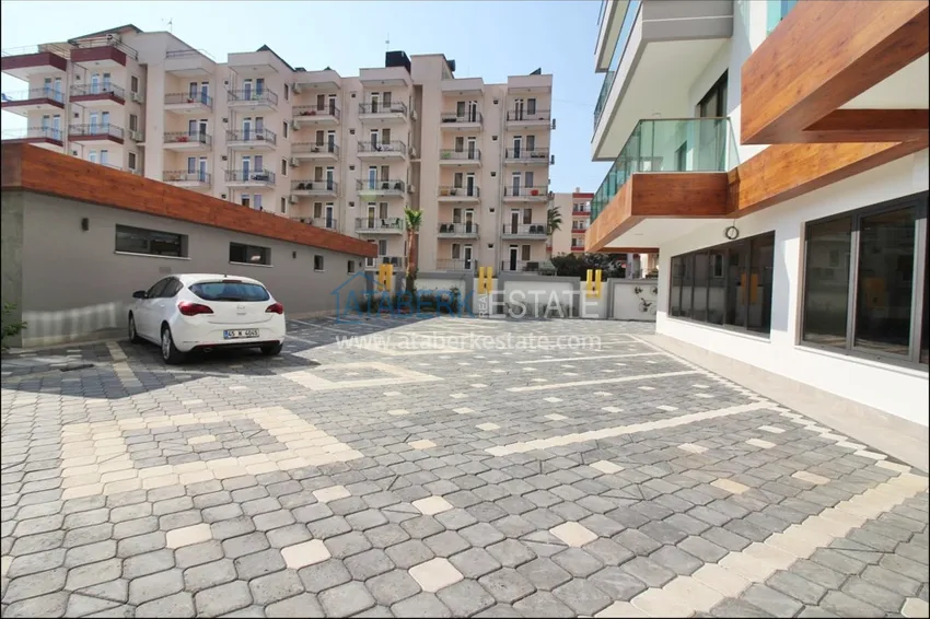 Квартиры в Махмутларе с чистовой отделкой в новом комплексе на первой береговой линии 14 